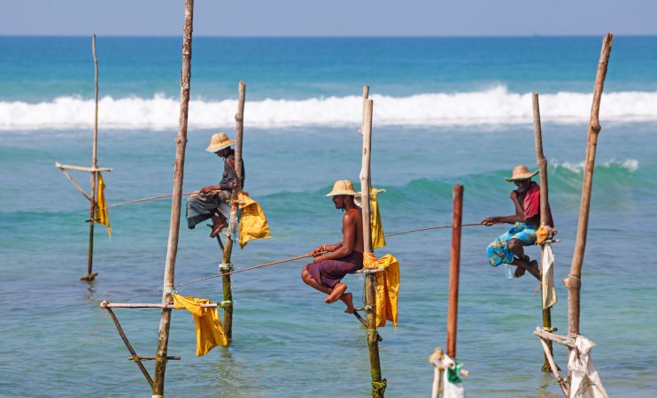 Weligama,,Sri,Lanka,-,March,18,2016:,Fishermen,Sit,On